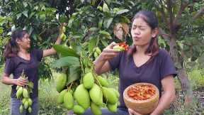 Survival skill in forest: Sour green mango with Hot salt chili - So mouth watering food