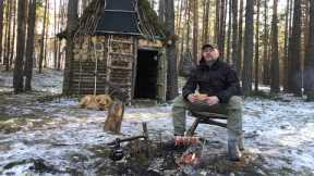2-storey forest log Cabin. Primitive bushcraft shelter for survival. Stone and wood floors