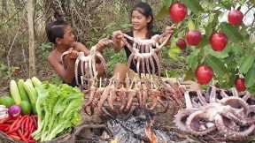 Yummy! Octopus arm spicy roasted and Wild red apple for food - Survival cooking in forest