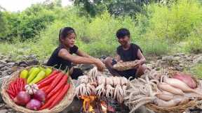 Squid pork spicy grilled on the rock for dinner - Survival cooking in forest