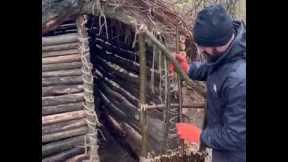 Building a cozy shelter under a fallen tree - Survival Skill