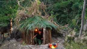 Build a warm and cozy secret survival shelter under a fallen tree. Bushcraft Camping