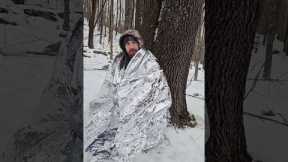 Pocket sized heated survival shelter