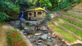 I built a survival house by the waterfall — with a pool, garden and warm stove. Off-grid life