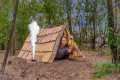 Building a cozy survival shelter.