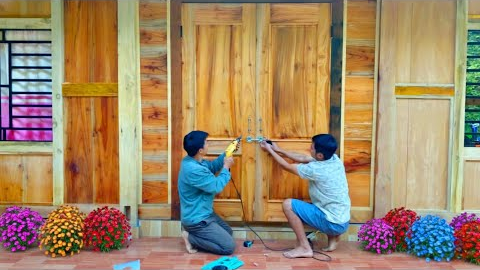 After 2 days of struggling, DAU & PHIN completed a super beautiful wooden main door